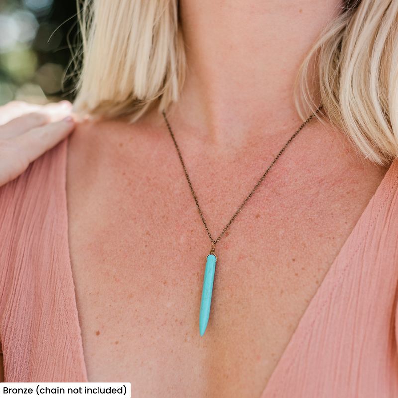 Long Dyed Turquoise Howlite Round Spike Point Pendant